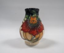A SMALLER MOORCROFT ANNA LILY PATTERN VASE, of bulbous form, with impressed and painted marks to