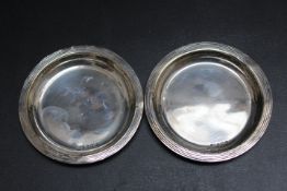 TWO HALLMARKED SILVER PIN DISHES BY GOLDSMITHS AND SILVERSMITHS CO LTD, one dated London 1924 and