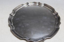 A HALLMARKED SILVER TRAY BY BARROWCLIFT SILVERCRAFT - BIRMINGHAM 1977, plain with a piecrust border,