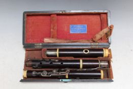 AN ANTIQUE THREE SECTION WOODEN FLUTE BY PROWSE OF LONDON, in fitted case A/F, case W 31.5