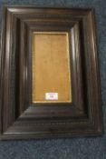 A 19TH CENTURY DUTCH EBONISED FRAME, with gold slip and glazed, frame W 11 cm, slip rebate 12 x 23.5