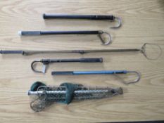 A SELECTION OF ANTIQUE AND VINTAGE HARDY FISHING GAFFS. complete with landing net