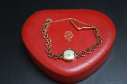 ROLEX - A LADIES HALLMARKED 9 CARAT GOLD WRIST WATCH, with Tudor box, approx weight 11.2g, Dia 1.5