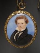 A 19TH CENTURY OVAL PORTRAIT MINIATURE OF A GEORGIAN GENTLEMAN, with black coat and tie, unsigned,