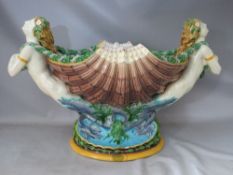A LARGE AND IMPRESSIVE MINTON MAJOLICA CENTREPIECE 'FLOWER BEARERS' - CIRCA 1875,