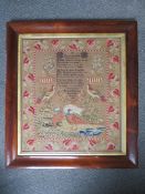 A 19TH CENTURY ENGLISH NEEDLEWORK SAMPLER BY HANNAH ROBINSON AGED 12, 1855, a floral border with