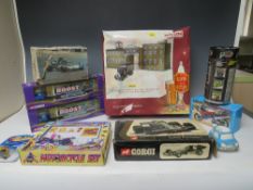 A BOX OF MISCELLANEOUS DIE CAST ITEMS, to include boxed Lledo Brewing In Britain Scammell, six wheel