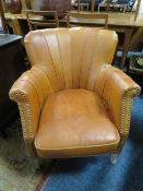 A MODERN TAN LEATHER CLUB STYLE ARMCHAIR A/F