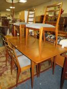 A RETRO TEAK EXTENDING DRAWLEAF TABLE & SIX CHAIRS - POSSIBLY McINTOSH