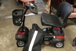 A CARE CO MOBILITY SCOOTER -WITH KEYS, WITH CHARGE AND COVERS