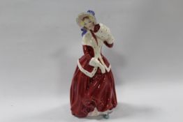 A ROYAL DOULTON FIGURE CHRISTMAS MORN