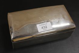 A HALLMARKED SILVER CIGARETTE BOX A/F