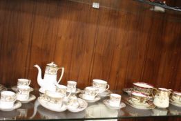 A NORITAKE PART TEA & COFFEE SERVICE, comprising coffee pot, cream, sugar, six coffee cans and
