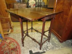 A SMALL MAHOGANY DROPLEAF TABLE WITH SPINDLE LEGS