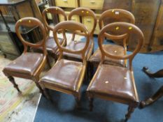A SET OF SIX VICTORIAN MAHOGANY CROWN BACK DINING CHAIRS