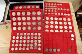 A HARD CASE CONTAINING TRAYS OF COLLECTABLE COINS ETC