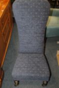 AN UPHOLSTERED EDWARDIAN PRAYER CHAIR