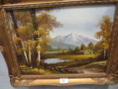 A GILT FRAMED OIL ON CANVAS OF MOUNTAIN RIVERSIDE SCENE