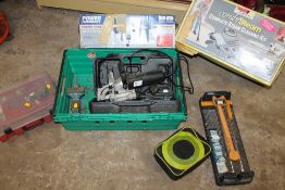 A BOXED STEAMER KIT, A BOXER ROUTER TABLE AND A BISCUIT CUTTER POWER TOOL ETC