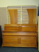 A MODERN CHERRY SLEIGH BED WITH BASE - W 162 cm