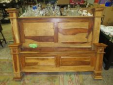 A LARGE TEAK MODERN BED