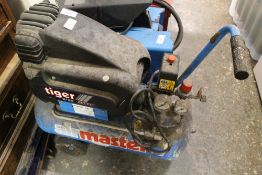 A TIGER MASTER AIR COMPRESSOR