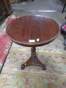 A MAHOGANY PEDESTAL OCCASIONAL TABLE