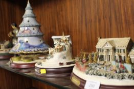 A ELVIS PRESLEY BLUE CHRISTMAS MUSICAL ILLUMINATED TREE TOGETHER WITH OTHER CHRISTMAS DISPLAYS ETC
