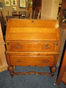 A VINTAGE OAK BUREAU