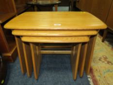 A MODERN ERCOL BLONDE NEST OF TABLES