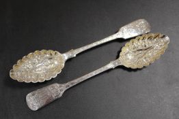 A MATCHED PAIR OF HALLMARKED SILVER BERRY SPOONS
