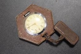 A VINTAGE SWISS 15 JEWELS WATCH WITH SKELETON BACK