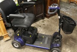 A PRIDE GOGO MOBILITY SCOOTER WITH KEY AND CHARGER