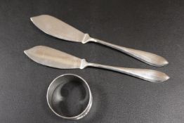 TWO KNIVES AND A NAPKIN RING