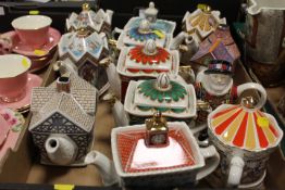 A TRAY OF ASSORTED COLLECTABLE SADDLER TEA POTS