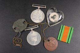 A SMALL COLLECTION OF MEDALS, DOG TAGS ETC