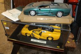 TWO JAGUAR MODEL CONCEPT CARS WITH ONE DISPLAY BOX