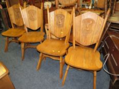 A CARVED OAK SET OF FOUR HERALDIC LION CHAIRS WITH DINING TABLE