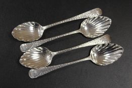 FOUR MATCHED HALLMARKED SILVER SHELL BOWL TEA SPOONS