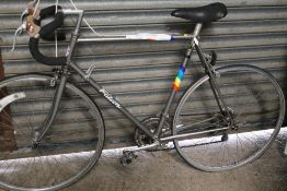 A VINTAGE FALCON GENTS RACING BIKE WITH 12 GEARS