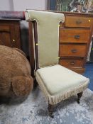 AN ANTIQUE MAHOGANY FRAMED PRAYER CHAIR