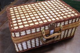 A WICKER PICNIC HAMPER WITH CONTENTS