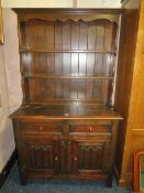 A TRADITIONAL OAK LINENFOLD WELSH DRESSER