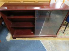 A MODERN MAHOGANY GLAZED BOOKCASE