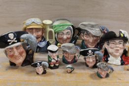 NINE ASSORTED ROYAL DOULTON CHARACTER JUGS TO INCLUDE A GRADUATING SET OF THREE LONG JOHN SILVER