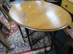 AN OAK BARLEYTWIST DROPLEAF TABLE