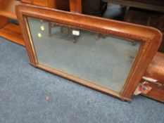 AN ANTIQUE OVERMANTLE MIRROR