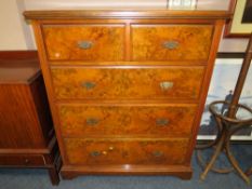 AN EDWARDIAN MAHOGANY WALNUT FIVE DRAWER CHEST - W 107 CM