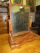 AN ANTIQUE MAHOGANY DRESSING MIRROR