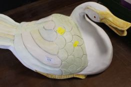 A LARGE CARVED WOODEN GOOSE